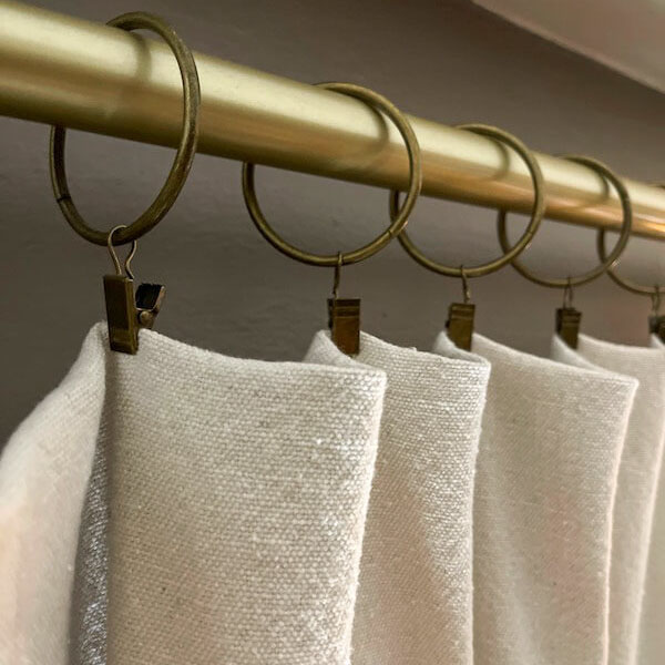 Gold drapery clips - an easy way to hang drop coth curtains